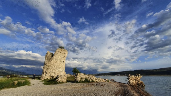 Panoramic view of a ruin on the waterfront in a cloudy blue sky, Vecka kula, Vecka Kula, Starigrad, Starigrad-Paklenica, Zadar, Croatia, Europe