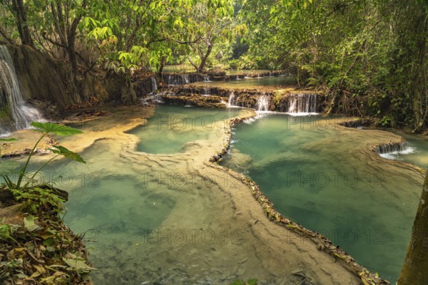 The multi-levelled Kuang Si waterfall near Luang Prabang, Laos, Asia