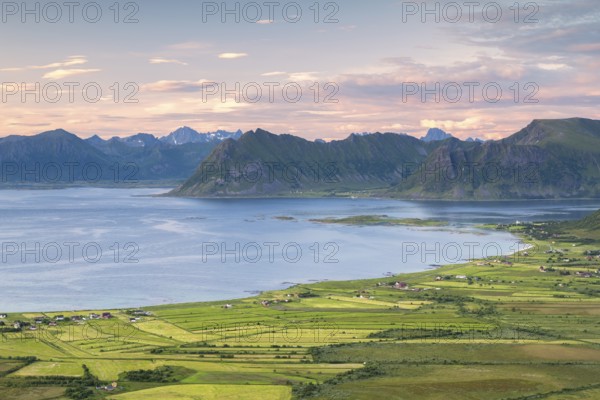View of the coast and mountains from Mount Hoven, Gimsoy, Lofoten, Norway, Europe