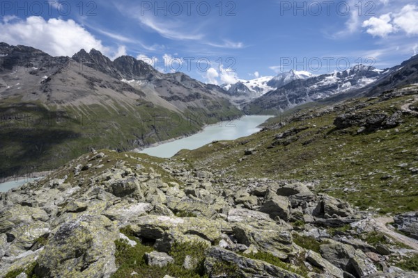 View of idyllic mountain landscape with blue mountain lake, Lac des Dix reservoir, behind mountain peak Mont Blanc de Cheilon, Hérménence, Valais Alps, Valais, Switzerland, Europe