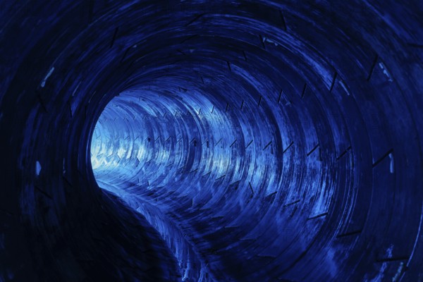 Blue illuminated Emscher sewer in front of commissioning, Oberhausen, Ruhr area, North Rhine-Westphalia, Germany, Europe