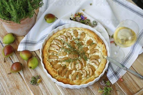 Tart with Gaishirtle and sheep's cheese, Stuttgarter Gaishirtle, pear variety, fruit, table decoration, thyme, baking, typical Swabian, Swabian cuisine, traditional cuisine reinterpreted, vegetarian, food photography, studio, Germany, Europe