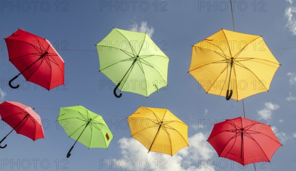 Many umbrellas hang over the street in Vejle, Jutland, Denmark, Scandinavia, Europe