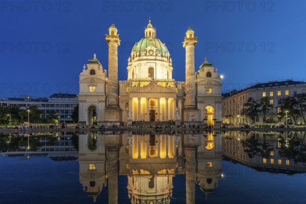 The baroque Karlskirche church at dusk, Vienna, Austria, Europe