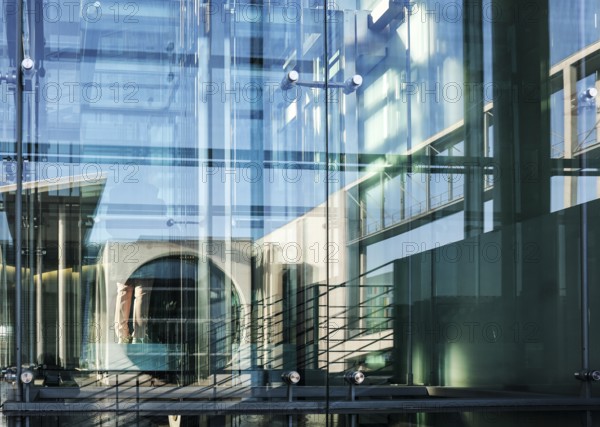 The Marie-Elisabeth Lüders House is reflected in the window of the Paul Löbe House, both parliament buildings belong to the German Bundestag, Berlin, 11 February 2025, Berlin, Berlin, Germany, Europe