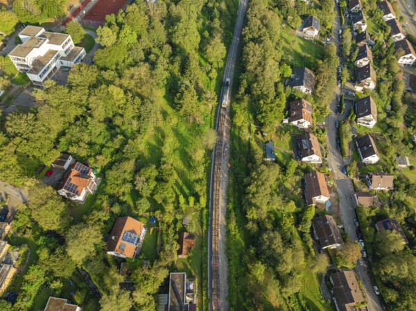 Railway line through green residential areas and landscapes, track construction, rail delivery for Hermann Hessebahn, Calw, Black Forest, Germany, Europe