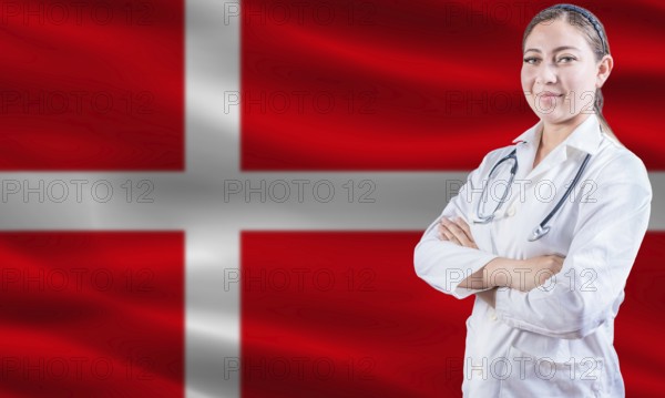 Female doctor on danish flag. Doctor with crossed arms on danish flag. Denmark health and care concept