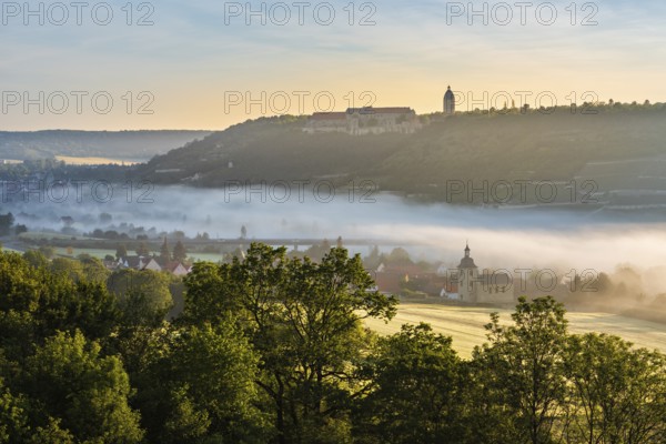 View of Freyburg with Neuenburg Castle, in front the church of Nißmitz, morning fog in the Unstrut valley, Freyburg (Unstrut), Saxony-Anhalt, Germany, Europe