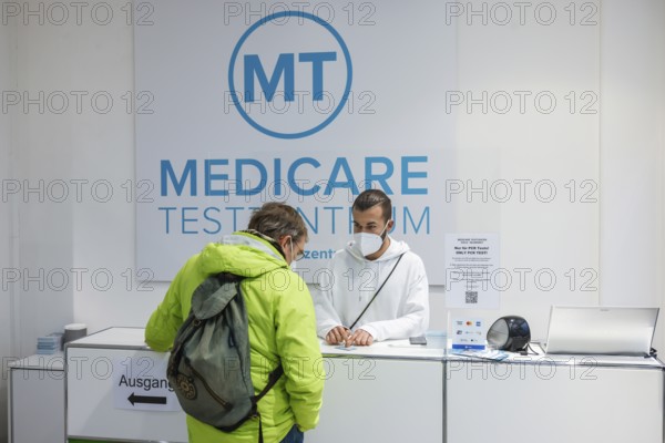 Cologne, North Rhine-Westphalia, Germany - Covid rapid test at the Medicare test centre, consultation