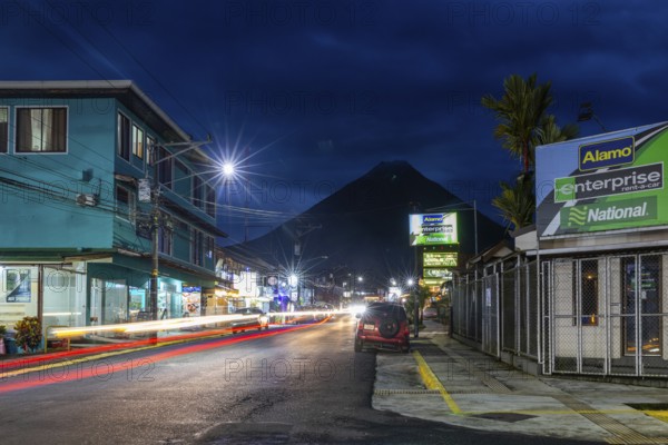 Road with view of the Arenal Volcano, Blue Hour, La Fortuna, Guanacaste, Costa Rica, Central America