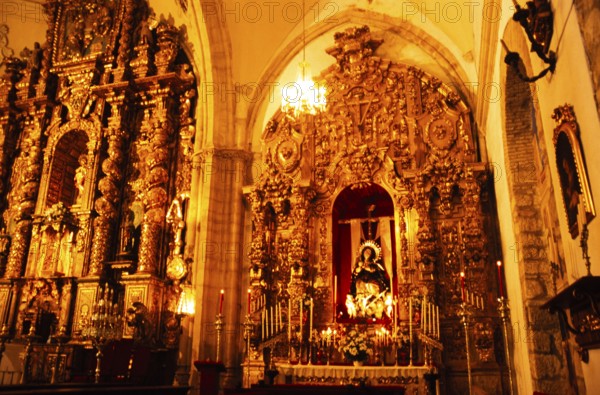 Elaborately decorated gold altar in the cathedral church of Santa Maria La Mayor, Ronda, Andalusia, Spain, Europe