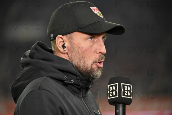 Coach Sebastian Hoeneß VfB Stuttgart Portrait, in interview Microphone Microphone Logo DAZN, MHPArena, MHP Arena Stuttgart, Baden-Württemberg, Germany, Europe