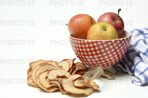 Apple rings and apples in peel, dried fruit