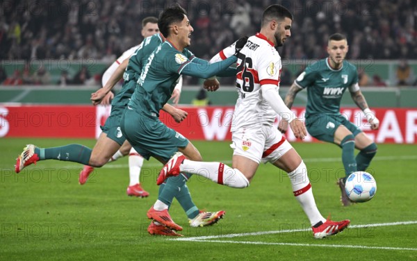 Running duel Deniz Undav VfB Stuttgart (26) Action on the ball against Dimitrios Giannoulis FC Augsburg FCA (13) DFB-Pokal, MHPArena, MHP Arena Stuttgart, Baden-Württemberg, Germany, Europe
