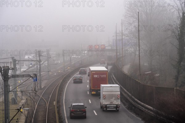 Dense fog, with visibility sometimes less than 100 metres, A40 motorway, city passage in Essen, North Rhine-Westphalia, Germany, Europe