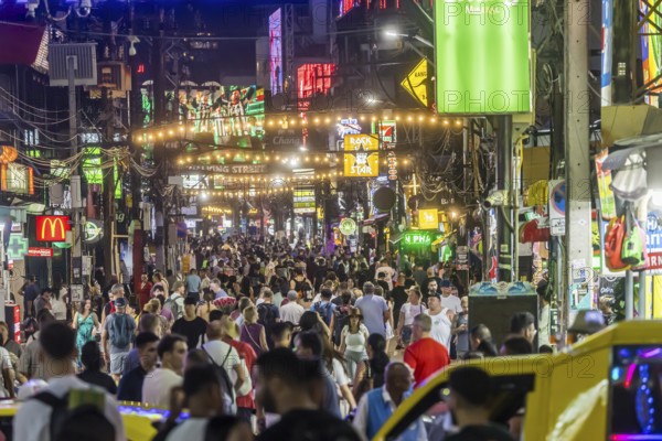 Crowds of people on Bangla Street in the evening. Nightlife on Bangla Walking Street with go-go bars, clubs, cannabis bars and extreme loudness. Patong, Kathu, Phuket Island, Thailand, Asia
