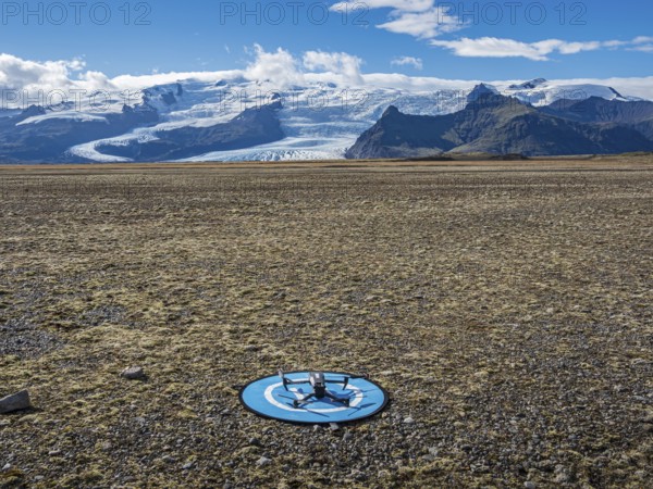 Drone on a landing pad, glacial floodplains of the Vatnajökull glacier, glacier Vatnajökull, Iceland, Europe