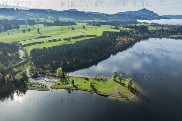 Sports facility and bathing area, lake Rottachsee, at village Petersthal, mt. Gruenten in the back, autumn, aerial view, Allgaeu, Bavaria, Germany, Europe