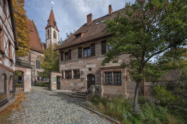 St. Nicholas and St. Ulrich Church, Kirchenberg 15, on the right of the vicarage, Kirchenberg 13, Nuremberg-Mögeldorf, Middle Franconia, Bavaria, Germany, Europe
