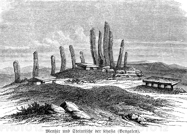 Menhir and stone tables of the Khasi, an indigenous people, today in the state of Meghalaya, megalithic memorial stones, India, vertical stones, mountainous landscape, history of mankind, historical illustration 1880, Asia