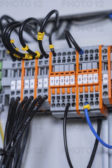 Detailed view of individual circuit-breakers in a larger electrical system, professional technology recognisable, switch cabinet construction, PV system construction, major customers, Enzkreis, Germany, Europe