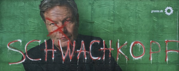 Denigration of a large poster for the 2025 federal election by the Greens with Robert Habeck, Witten, Ruhr area, Germany, Europe