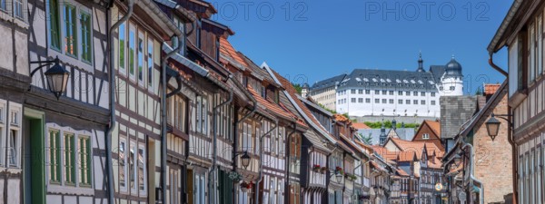 Street with half-timbered houses in the old town, the castle in the background, Stolberg im Harz, Saxony-Anhalt, Germany, Europe