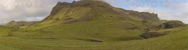 Grass and moss covered mountain close to Vik i Myrdal, South Iceland