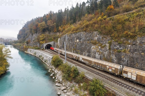 Goods train of the Austrian Federal Railways ÖBB Eisenbahn on the Arlbergbahn in autumn in Feldkirch, Austria, Europe