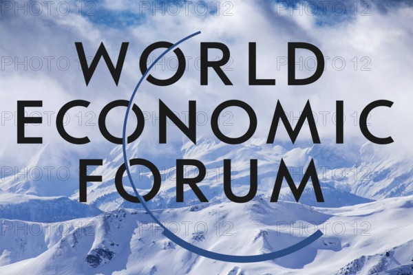 Logo of the WEF (World Economic Forum) against the background of a wintry snowy landscape in Davos