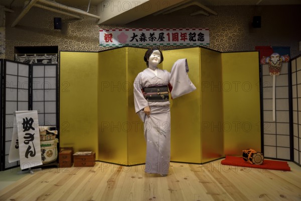 Geisha with mask in traditional costume, Omori, Tokyo, Japan, Asia
