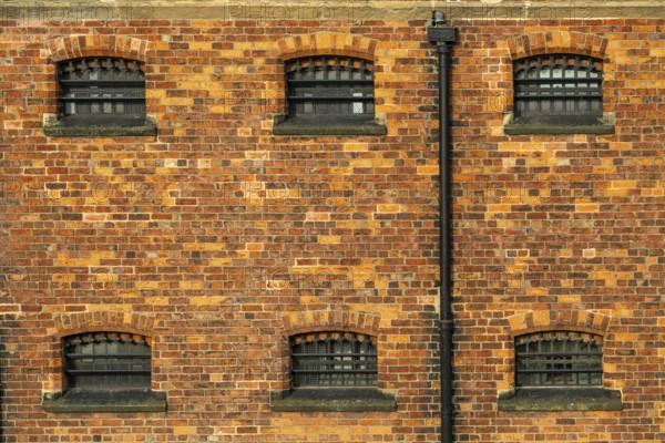 Cell windows with bars, exterior of Victorian jail museum, Lincoln Castle, city of Lincoln, Lincolnshire, England, UK