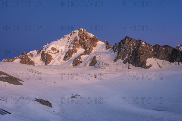High alpine mountain landscape at sunset, Glacier du Tour, glacier and mountain peak, summit of the Aiguille de Chardonnet, Chamonix, Haute-Savoie, France, Europe