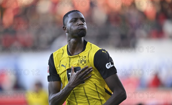 Goal celebration Serhou Guirassy Borussia Dortmund BVB (09) gesture hand on chest, coat of arms, Voith-Arena, Heidenheim, Baden-Württemberg, Germany, Europe