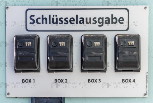 Key distribution boxes, safes, at a small hotel, guests receive a code with which they can open the boxes and remove the room key when reception is closed, late arrival, Germany, Europe