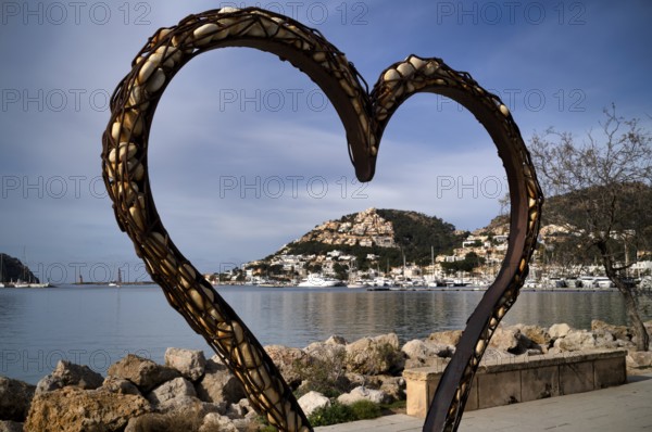 View through a heart of stones to the harbour of Port d'Andratx with marina, Majorca, Balearic Islands, Balearic Islands, Spain, Europe