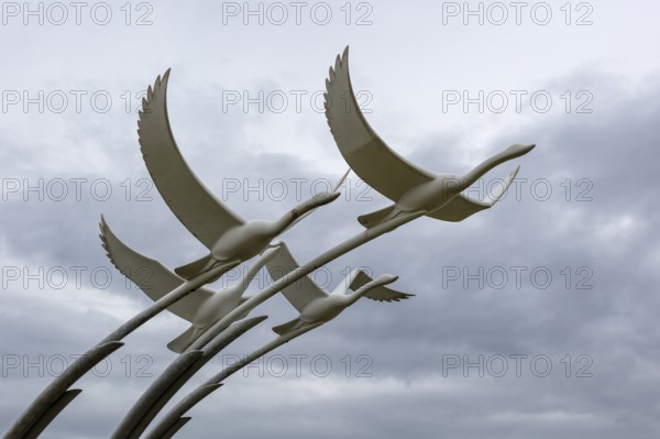 Detailed sculpture of flying birds, taken from below, Ballycastle