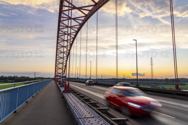 The Bridge of Solidarity, the longest tied-arch bridge in Germany, over the Rhine from Duisburg-Hochfeld to DU-Rheinhausen, the road bridge is dilapidated and has to be rebuilt, many thousands of lorries from the Logport port and cars use the bridge every day, new construction by 2040, Duisburg, North Rhine-Westphalia, Germany, Europe