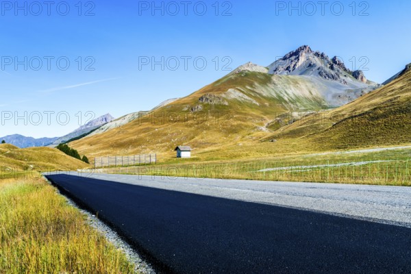 View of road and mountains at border pass Col de Larche (Colle della Maddelena), Provinz Cuneo, Département Alpes-de-Haute-Provence and Italy, France, Alps, Europe