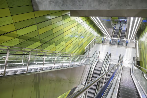 Modern metro station with smooth green walls and escalators, Frederiksberg Allé metro station, Copenhagen, Denmark, Europe