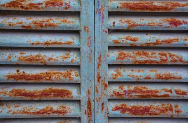 Weathered blue and red window shutter, mountain village Lakkoi, Crete, Greece, Europe
