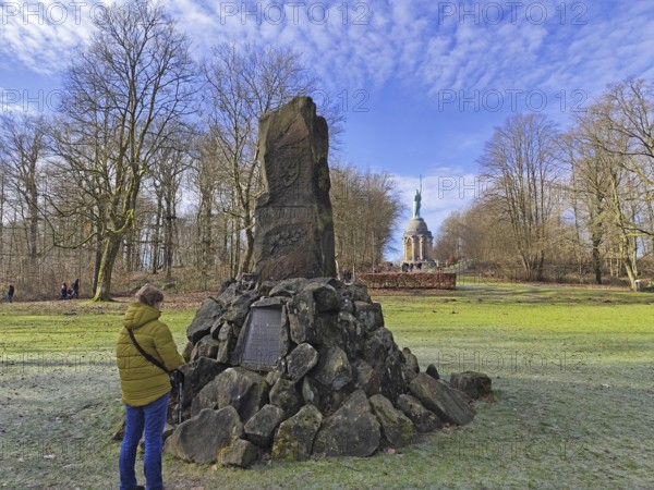 Woman looking at the Bismarck Monument, behind the Hermann Monument, Hiddesen, Detmold, Teutoburg Forest, North Rhine-Westphalia, Germany, Europe