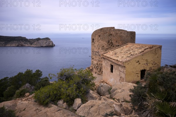 View from the Torre de Cala en Basset (also Torre de la Rabassada), watchtower from the late 16th century, to the Dragon Island, Sa Dragonera, with lighthouse Far de Tramuntana, Tramuntana Mountains, Serra de Tramuntana, Sant Elm, San Telmo, Andratx, Majorca, Balearic Islands, Balearic Islands, Spain, Europe