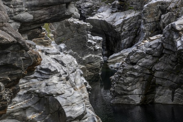 Rocks, granite rock formations in the Maggia River near Ponte Brolla, in the Maggia Valley, Valle Maggia, Canton Ticino, Switzerland, Europe