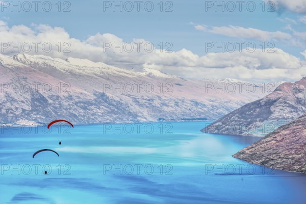 Paragliding over Lake Wakatipu, Queenstown, South Island, New Zealand, Oceania