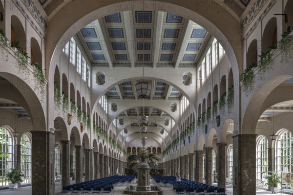 Promenade hall with fountain house with decorative Art Nouveau ceramic fountain made of majolica tiles, Kissingen spa, inaugurated in 1842, replaced by a new building in 1911, Bad Kissingen, Lower Franconia, Bavaria, Germany, Europe