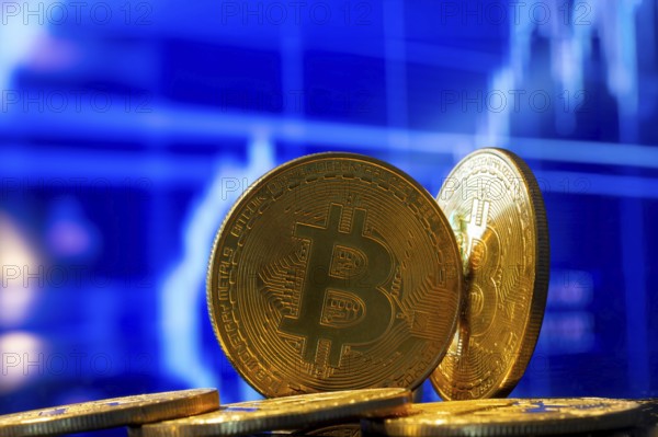 Close-up of symbolic bitcoins