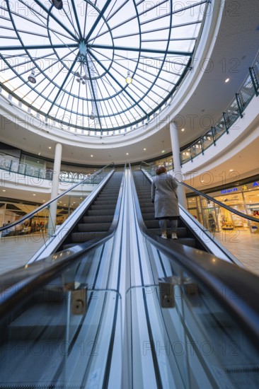 Escalator in a shopping centre leading to a large glass roof, Sterncenter Sindelfingen, Böblingen district, Germany, Europe