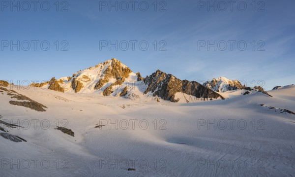 High alpine mountain landscape at sunset, Glacier du Tour, Glacier and mountain peaks in the evening light, summit of the Aiguille de Chardonnet, Chamonix, Haute-Savoie, France, Europe