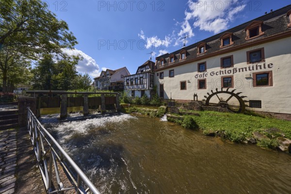 Castle mill, river Mümling, watermill, half-timbered house, historic building, metal railings, weir, trees, Lustgartenstraße, Erbach, Odenwald, Odenwaldkreis, Hesse, Germany, Europe